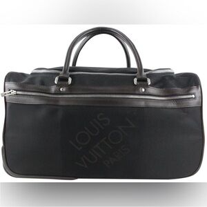 Authentic Louis Vuitton Damier Geant
Eole 60 Rolling Duffle Bag + COA